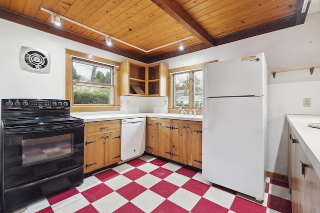 kitchen with wooden ceiling, white appliances, plenty of natural light, and light floors