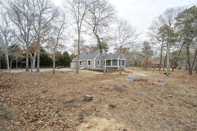 view of front of home with a chimney