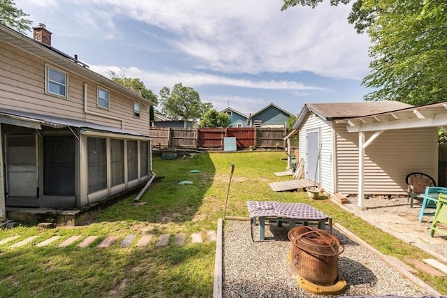 14 Bayside St, Springfield, MA 01109 - view of yard with a fire pit and a sunroom
