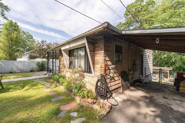 14 Bayside St, Springfield, MA 01109 - view of front of property with a carport and stone siding