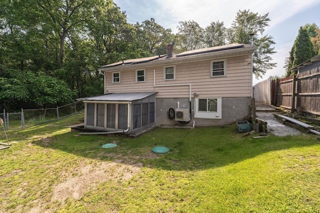 14 Bayside St, Springfield, MA 01109 - back of house with a sunroom and a cooling unit