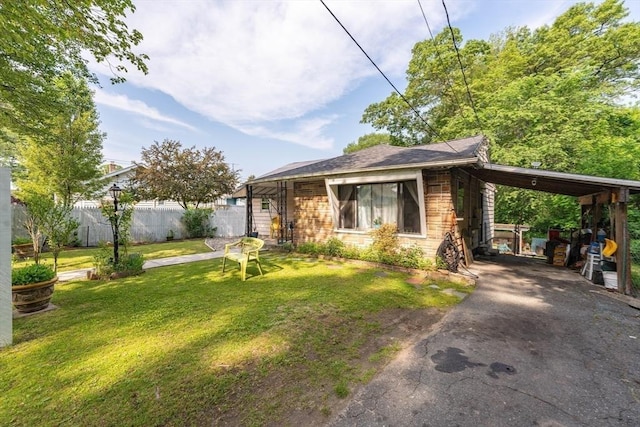 14 Bayside St, Springfield, MA 01109 - view of front of property with driveway, stone siding, and a carport