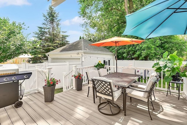 50 Oleander St, West Springfield, MA 01089 - wooden deck with outdoor dining space, a fenced backyard, grilling area, and an outdoor structure