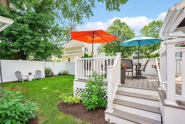 50 Oleander St, West Springfield, MA 01089 - fenced backyard featuring outdoor dining area and a wooden deck