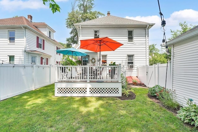 50 Oleander St, West Springfield, MA 01089 - rear view of property with a deck and a fenced backyard