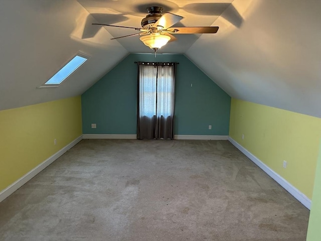 bonus room featuring vaulted ceiling, baseboards, and carpet floors