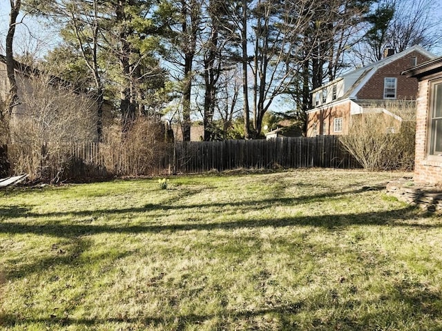 view of yard with fence