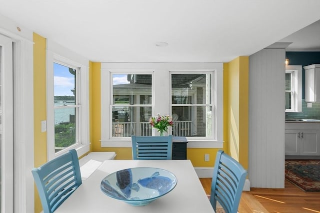 2 Howland Ave, Dartmouth, MA 02748 - dining space featuring wood finished floors and baseboards