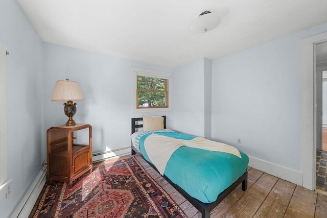 2 Howland Ave, Dartmouth, MA 02748 - bedroom with a baseboard radiator, hardwood / wood-style floors, and baseboards