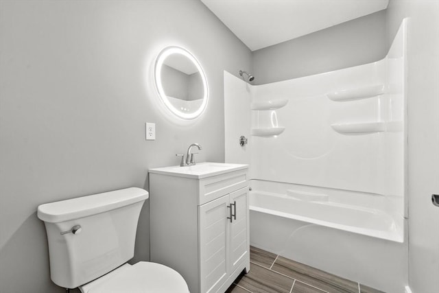 full bathroom featuring vanity, toilet, and shower / bath combination