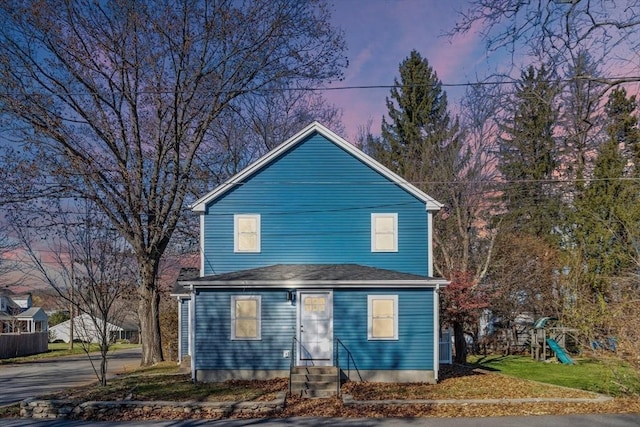 view of front property with a yard