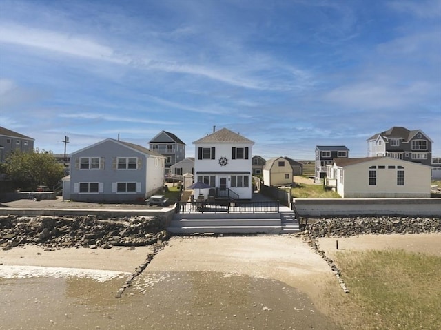 18 River St, Seabrook, NH 03874 - view of front facade with a residential view