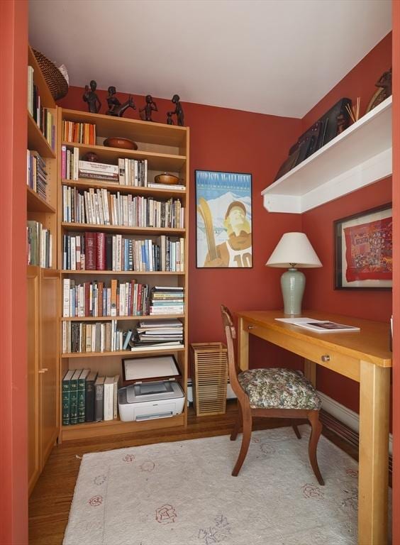 home office featuring hardwood / wood-style floors