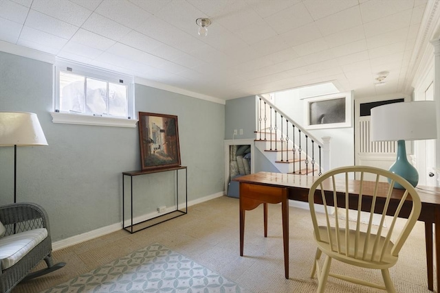 sitting room featuring ornamental molding