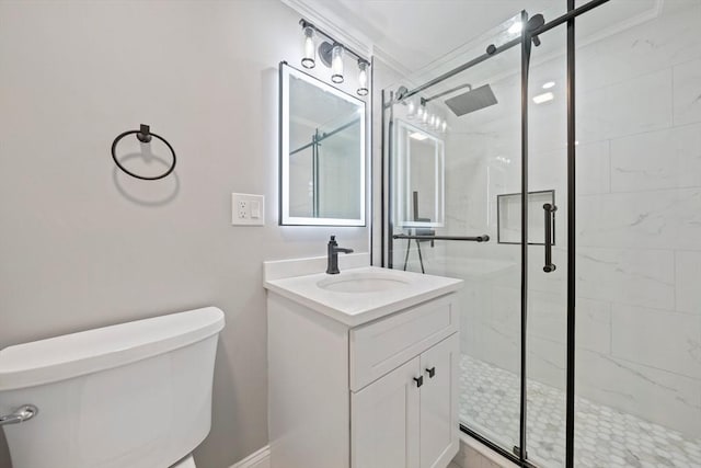 full bathroom with vanity, a shower stall, and toilet