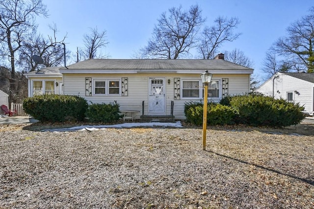 view of front of property with a chimney