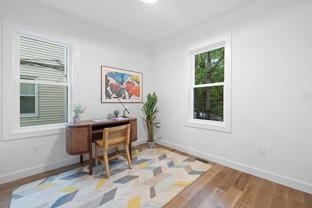 16 Edgar Ave, Somerville, MA 02145 - home office featuring light wood-style flooring and baseboards
