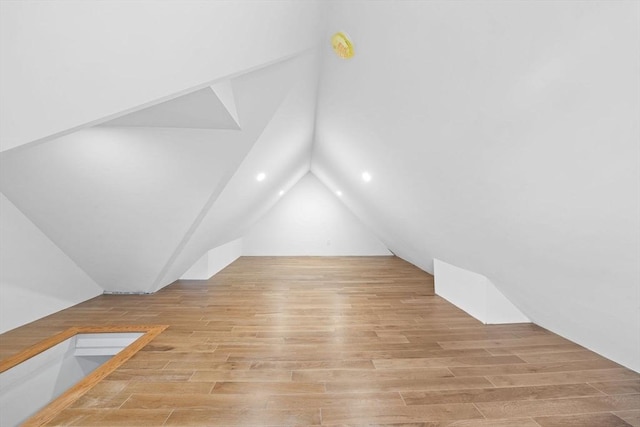 16 Edgar Ave, Somerville, MA 02145 - additional living space with lofted ceiling, wood finished floors, and recessed lighting