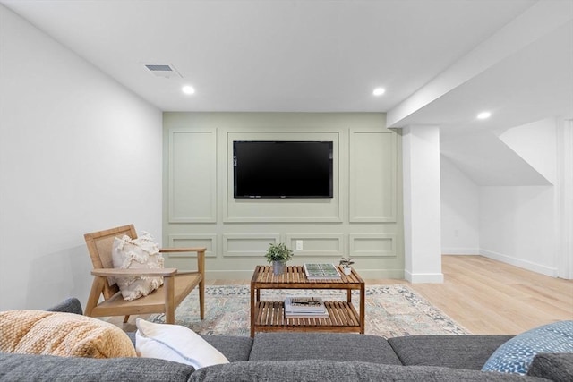 16 Edgar Ave, Somerville, MA 02145 - living room featuring light wood-style floors, recessed lighting, and baseboards