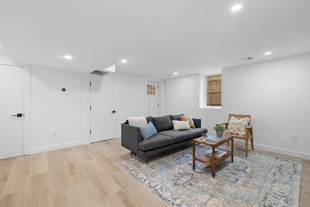 16 Edgar Ave, Somerville, MA 02145 - living area with light wood-style floors, recessed lighting, and baseboards