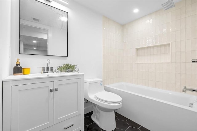 16 Edgar Ave, Somerville, MA 02145 - bathroom with toilet, tile patterned floors, vanity, recessed lighting, and bathtub / shower combination
