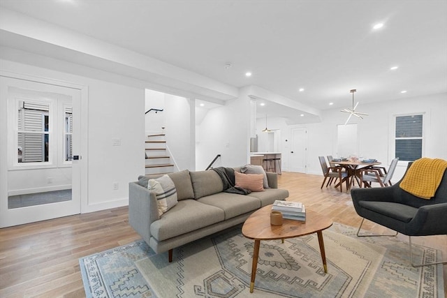 16 Edgar Ave, Somerville, MA 02145 - living area featuring light wood-style flooring, recessed lighting, stairway, and baseboards