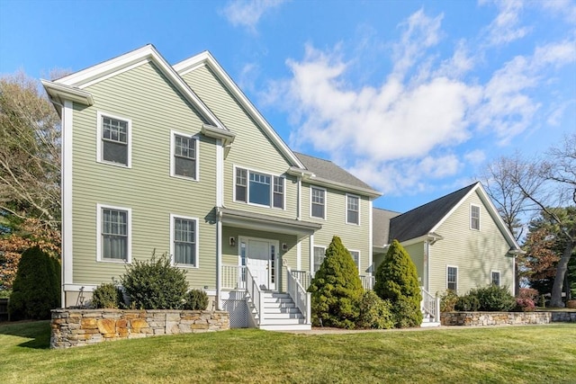 view of front of home with a front lawn