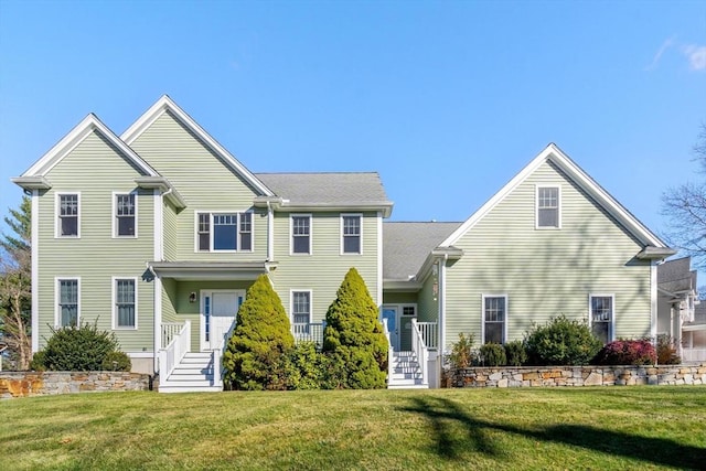 front facade with a front lawn