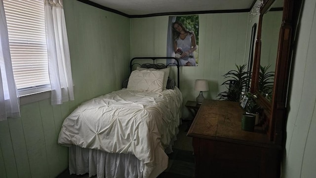 bedroom featuring crown molding