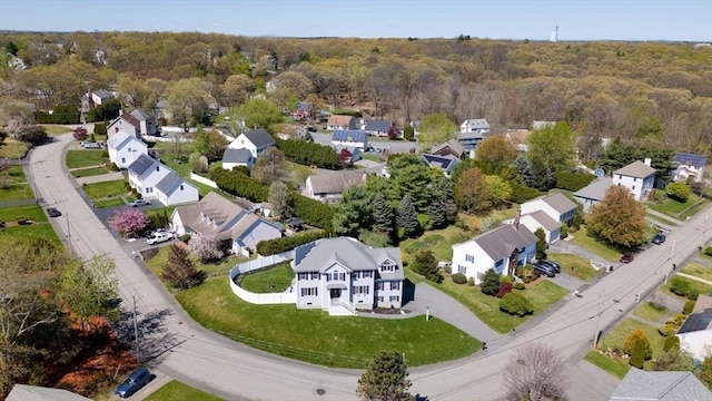 birds eye view of property with a residential view and a forest view