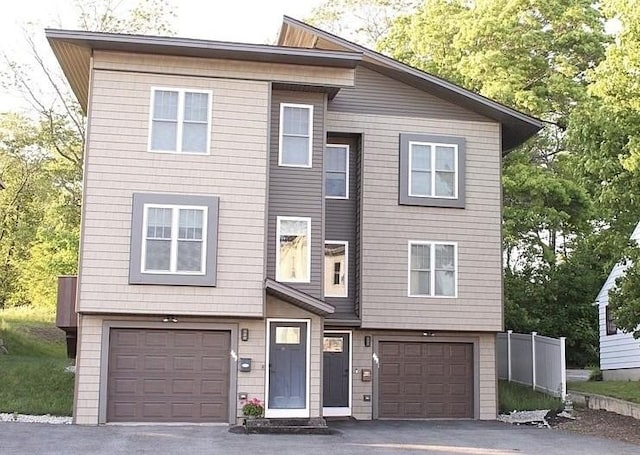 445 Cambridge St, Worcester, MA 01610 - view of front of house featuring an attached garage and asphalt driveway
