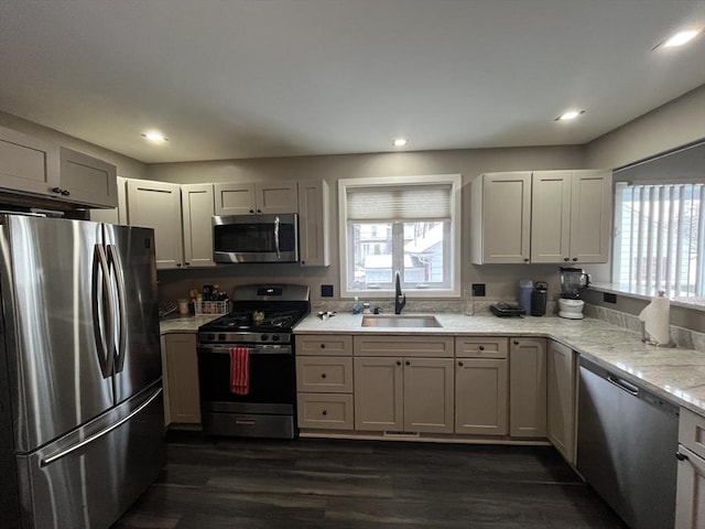 445 Cambridge St, Worcester, MA 01610 - kitchen with stainless steel appliances, a sink, dark wood-style floors, and recessed lighting
