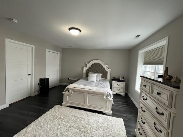 445 Cambridge St, Worcester, MA 01610 - bedroom with dark wood finished floors and baseboards