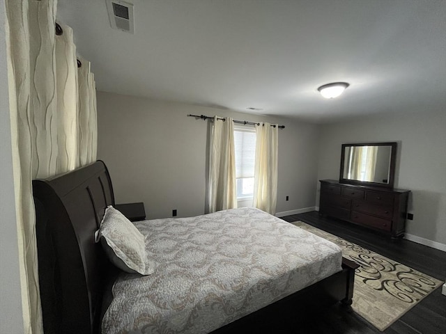 445 Cambridge St, Worcester, MA 01610 - bedroom with baseboards and dark wood-type flooring