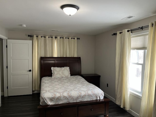 445 Cambridge St, Worcester, MA 01610 - bedroom with multiple windows and dark wood-style flooring