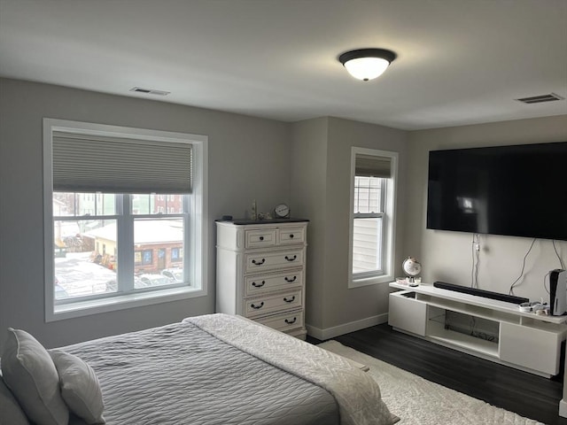 445 Cambridge St, Worcester, MA 01610 - bedroom with dark wood-style floors and baseboards