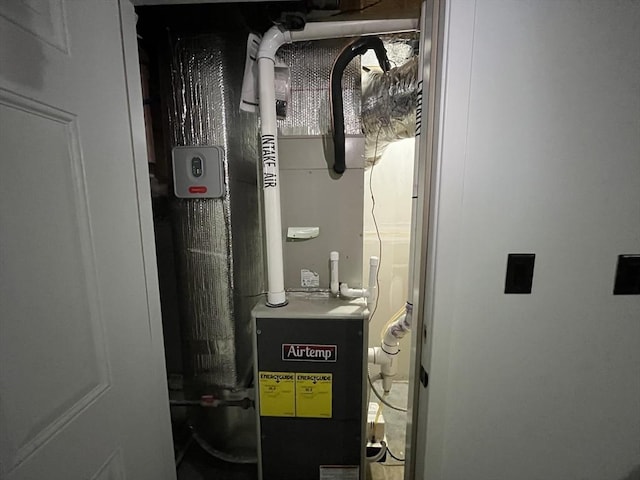 445 Cambridge St, Worcester, MA 01610 - utility room with heating unit