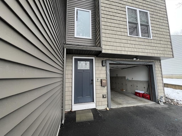 445 Cambridge St, Worcester, MA 01610 - entrance to property featuring asphalt driveway and a garage