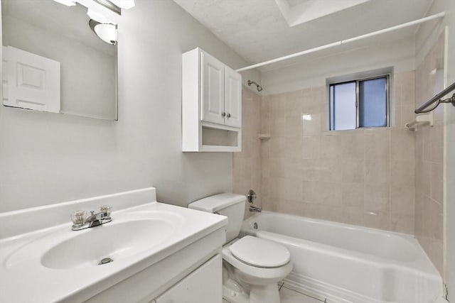 bathroom with toilet, vanity, and shower / tub combination