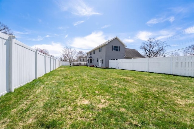 view of yard featuring a fenced backyard