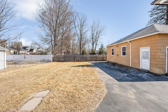 view of yard featuring a fenced backyard