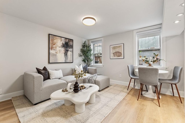 12 Fayette Unit B, Boston, MA 02116 - living room featuring light wood-style floors and baseboards