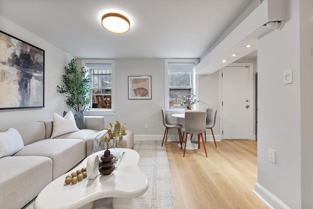 12 Fayette Unit B, Boston, MA 02116 - living area featuring plenty of natural light, light wood-style flooring, baseboards, and recessed lighting