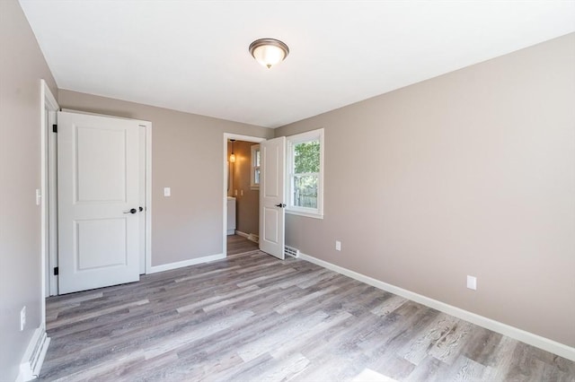 70 Ferncroft St, Longmeadow, MA 01106 - unfurnished bedroom featuring light wood-style floors