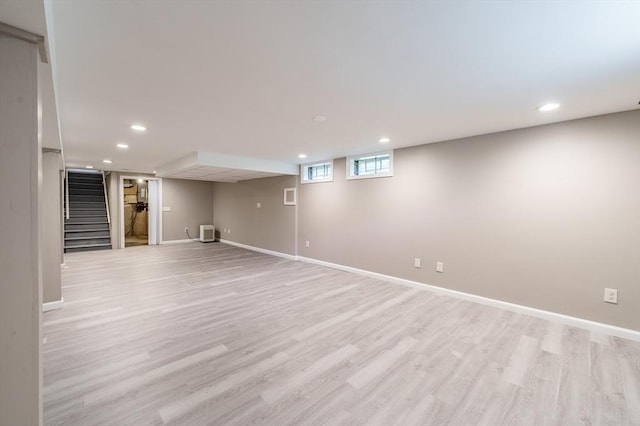 70 Ferncroft St, Longmeadow, MA 01106 - basement featuring light wood-type flooring, recessed lighting, and stairs