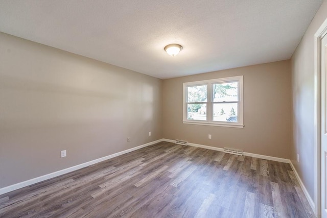 70 Ferncroft St, Longmeadow, MA 01106 - unfurnished room with dark wood-type flooring and baseboards