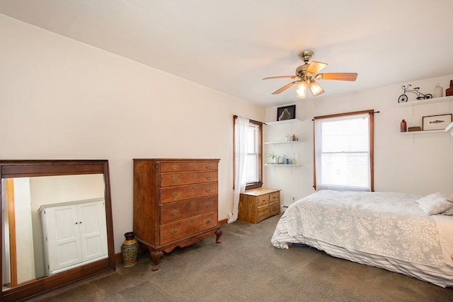 carpeted bedroom featuring ceiling fan