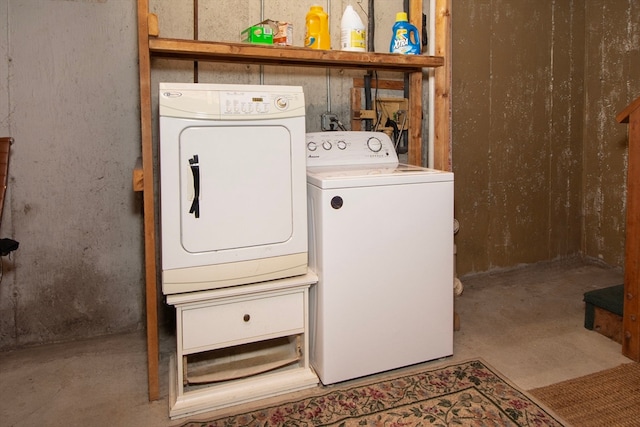 washroom featuring washer and dryer