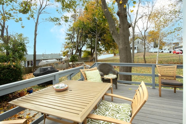 deck featuring a grill