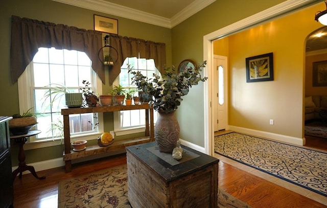 895 Dennison Dr, Southbridge, MA 01550 - entrance foyer with ornamental molding, arched walkways, and wood finished floors
